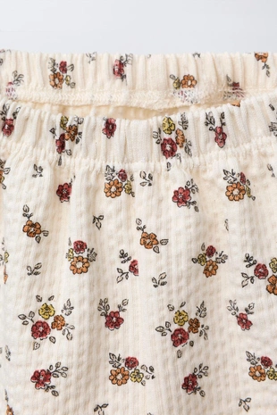 Жатые брюки в мелкий цветочек- Заказать в России