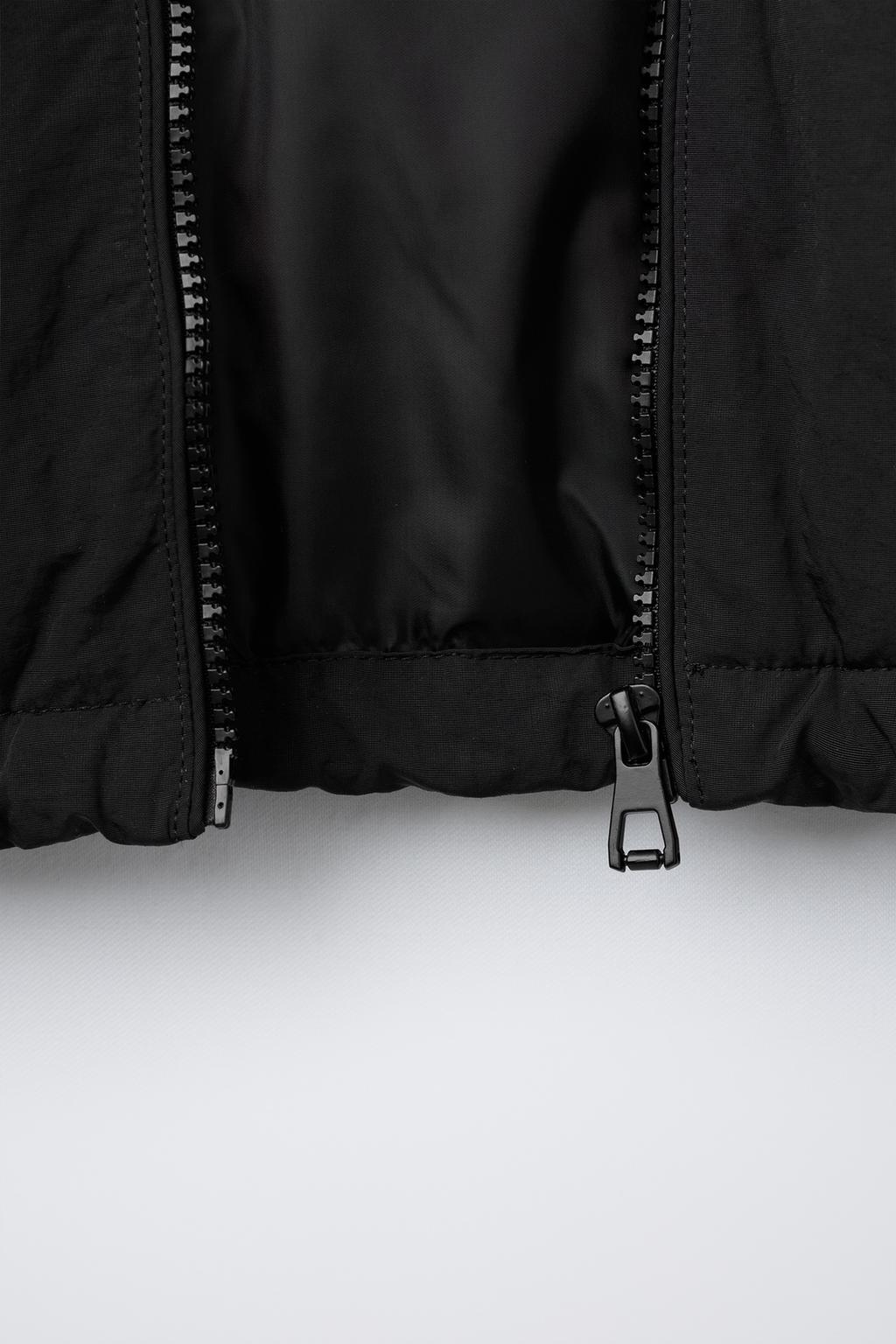 КУРТКА WATER REPELLENT С КАПЮШОНОМ UEFA CHAMPIONS LEAGUE ®