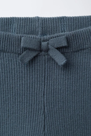 Трикотажные легинсы с бантом