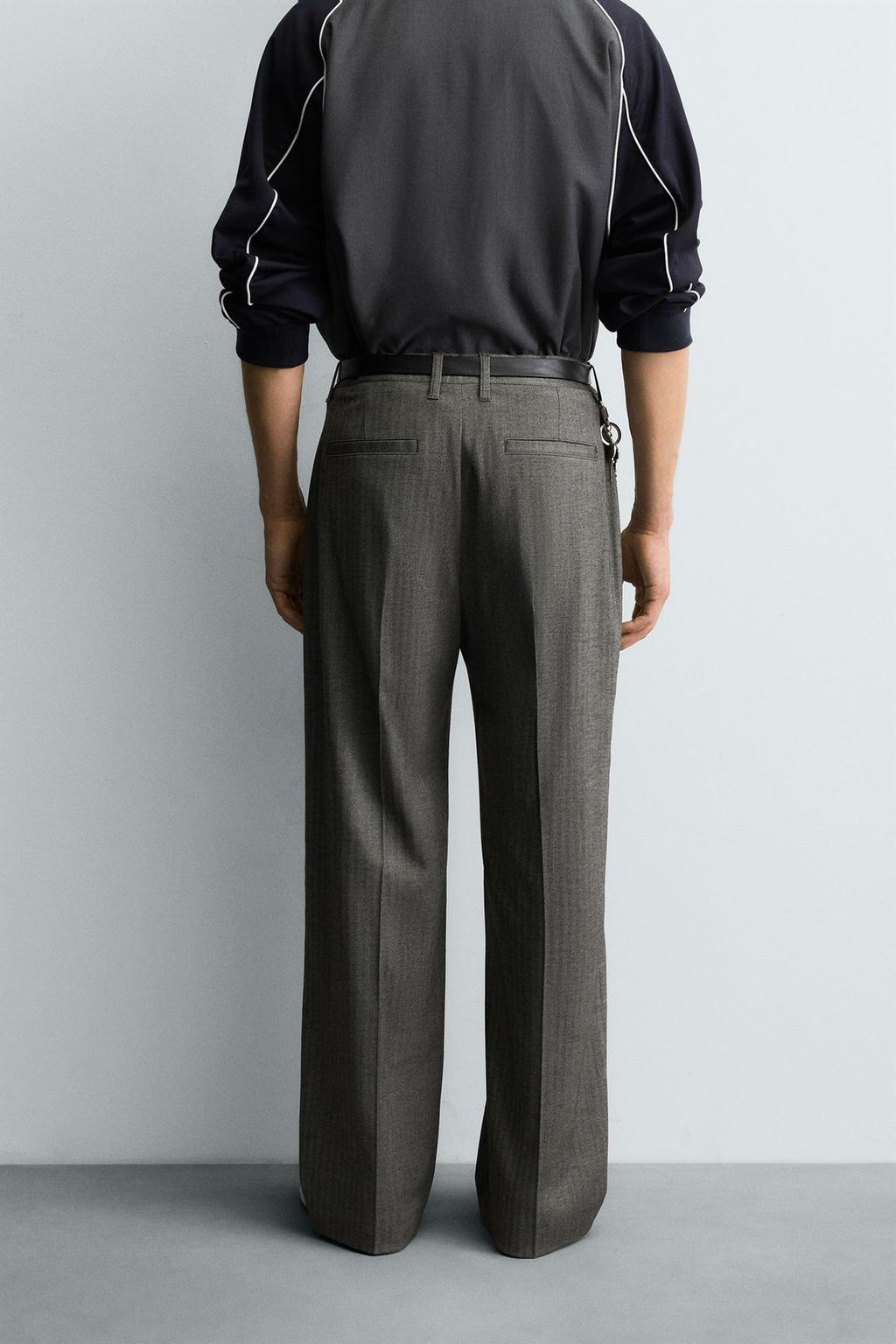 БРЮКИ FLARE FIT КОСТЮМНЫЕ В ЕЛОЧКУ