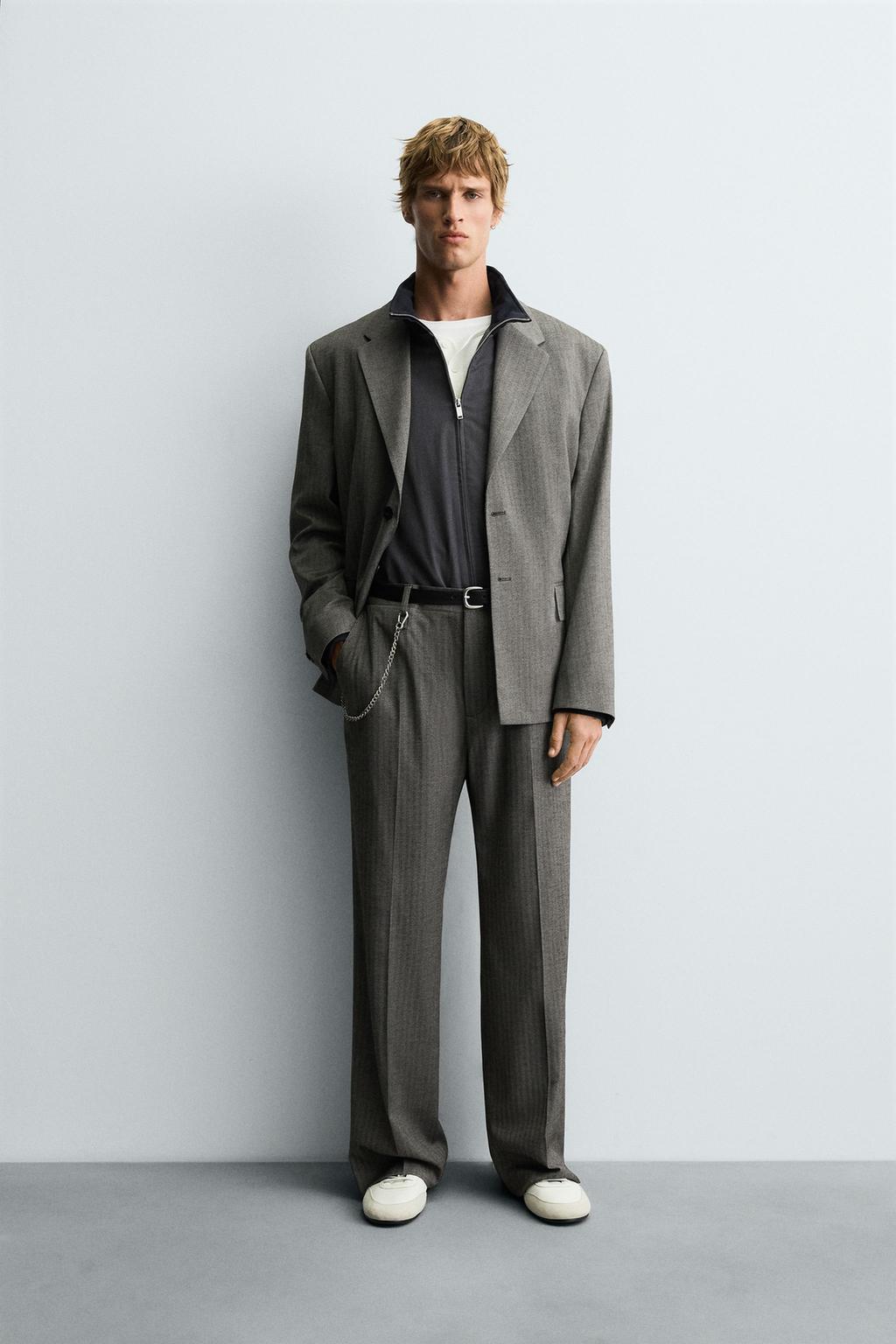 БРЮКИ FLARE FIT КОСТЮМНЫЕ В ЕЛОЧКУ