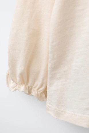 Футболка с вязаными нашивками- Заказать в России