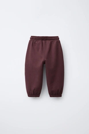 Брюки-джоггеры из мягкой ткани с этикеткой- Заказать в России