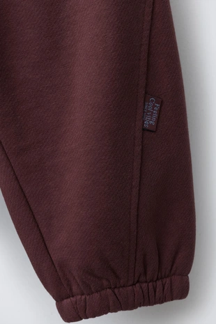 Брюки-джоггеры из мягкой ткани с этикеткой- Заказать в России