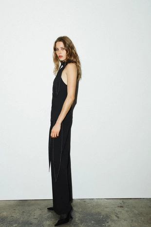 Топ с узлом и отделочной строчкой- Заказать в России