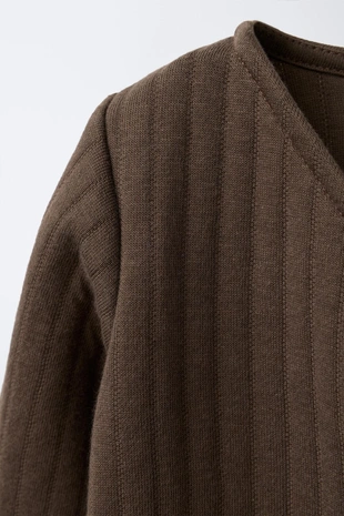 Стеганый комбинезон- Заказать в России