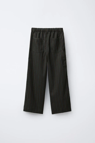 Брюки в полоску с нашивкой- Заказать в России