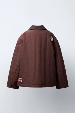 Стеганая куртка с нашивками- Заказать в России