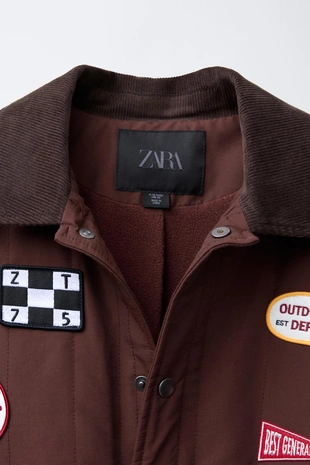 Стеганая куртка с нашивками- Заказать в России