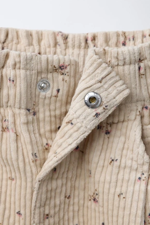 Вельветовые брюки с цветочным принтом- Заказать в России