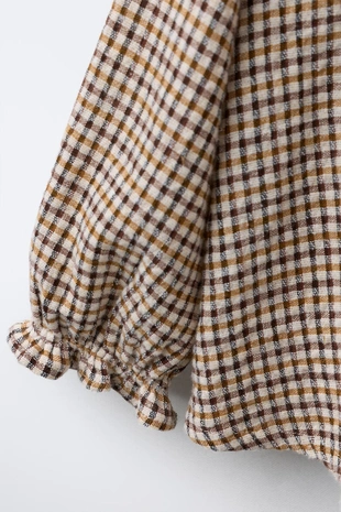 Блузка в клетку с воланами- Заказать в России