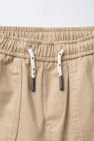 Брюки-джоггеры в стиле колор-блок- Заказать в России