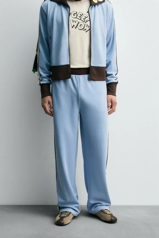 Контрастные брюки-джоггеры HARRY LAMBERT FOR ZARA X DISNEY- Заказать в России