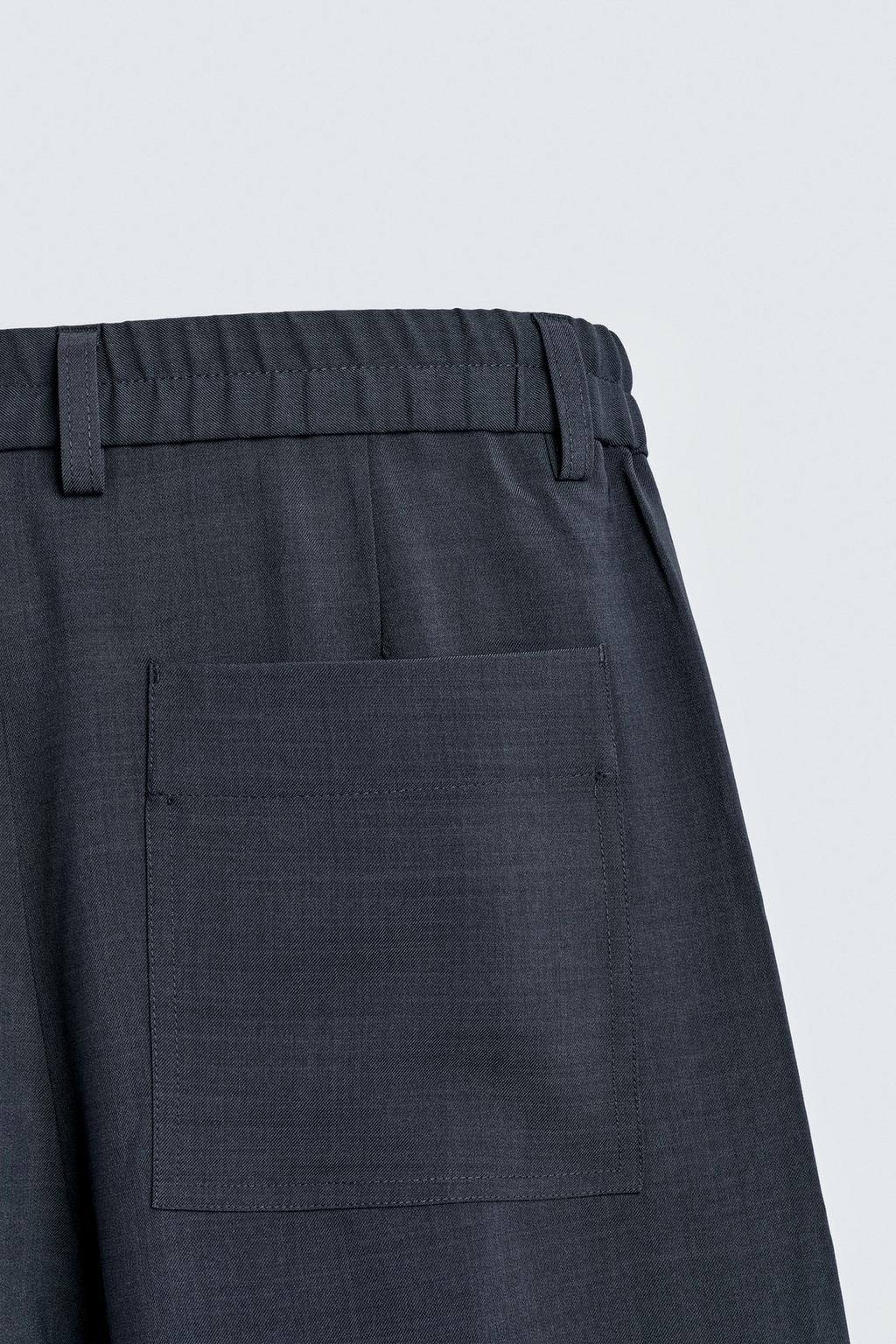 СТРУЯЩИЕСЯ БРЮКИ RELAXED FIT