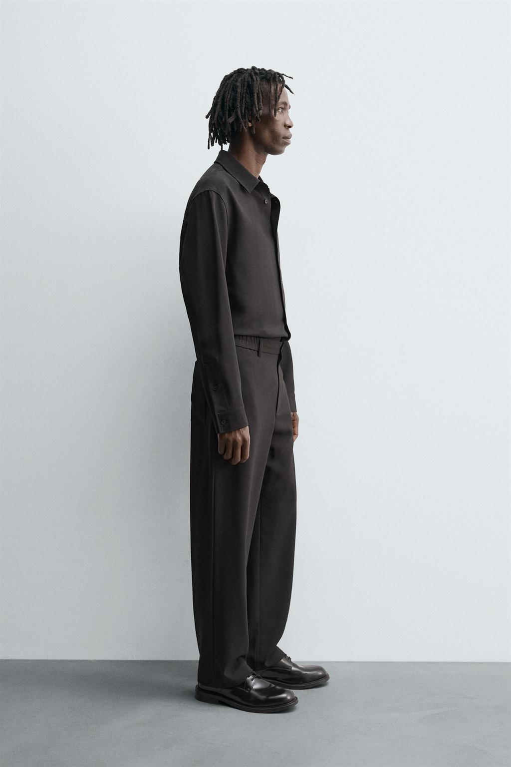 СТРУЯЩИЕСЯ БРЮКИ RELAXED FIT