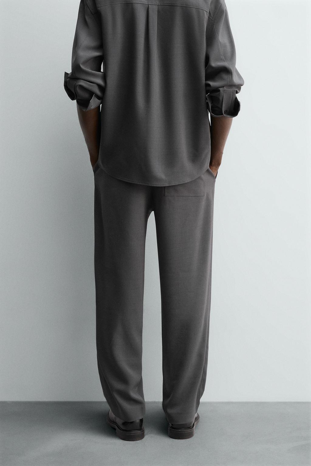 СТРУЯЩИЕСЯ БРЮКИ RELAXED FIT