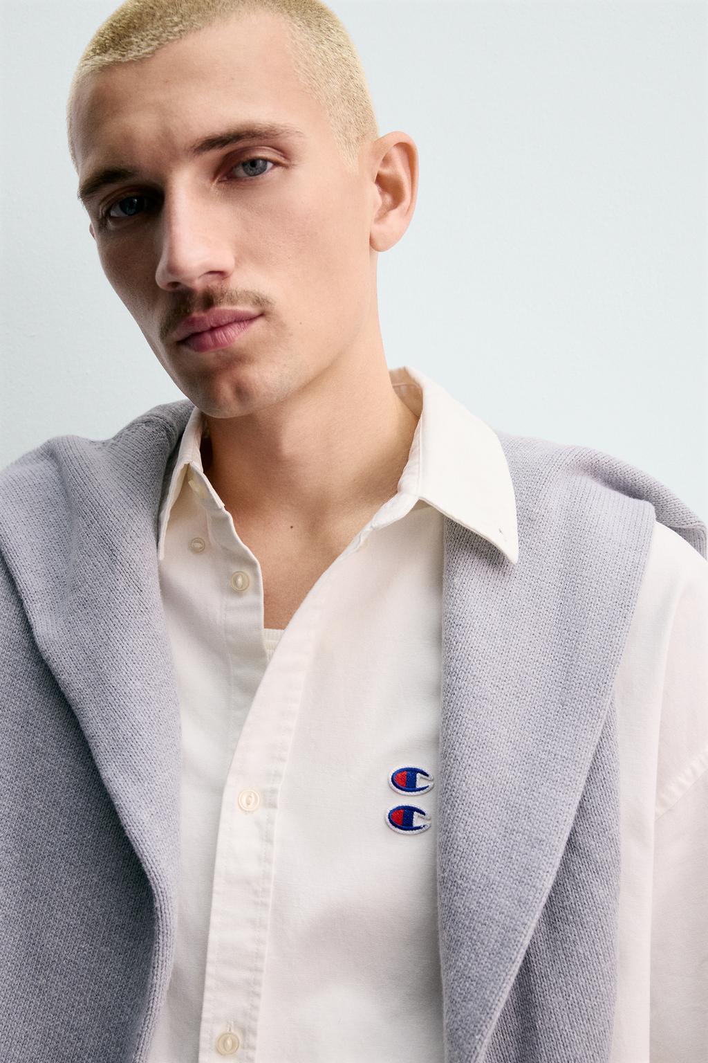 РУБАШКА ОКСФОРД С НАШИВКАМИ CHAMPION ® X ZARA