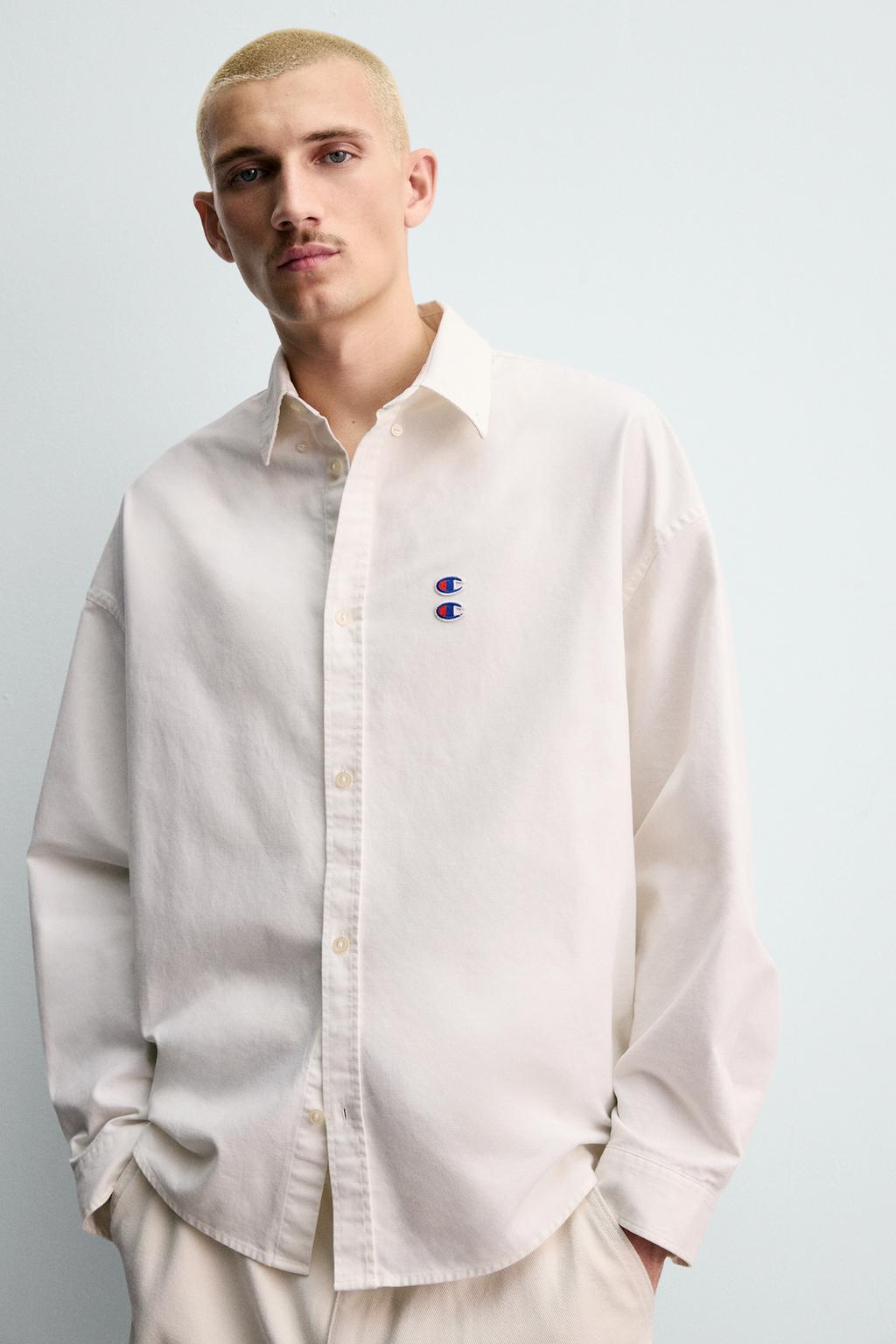 РУБАШКА ОКСФОРД С НАШИВКАМИ CHAMPION ® X ZARA