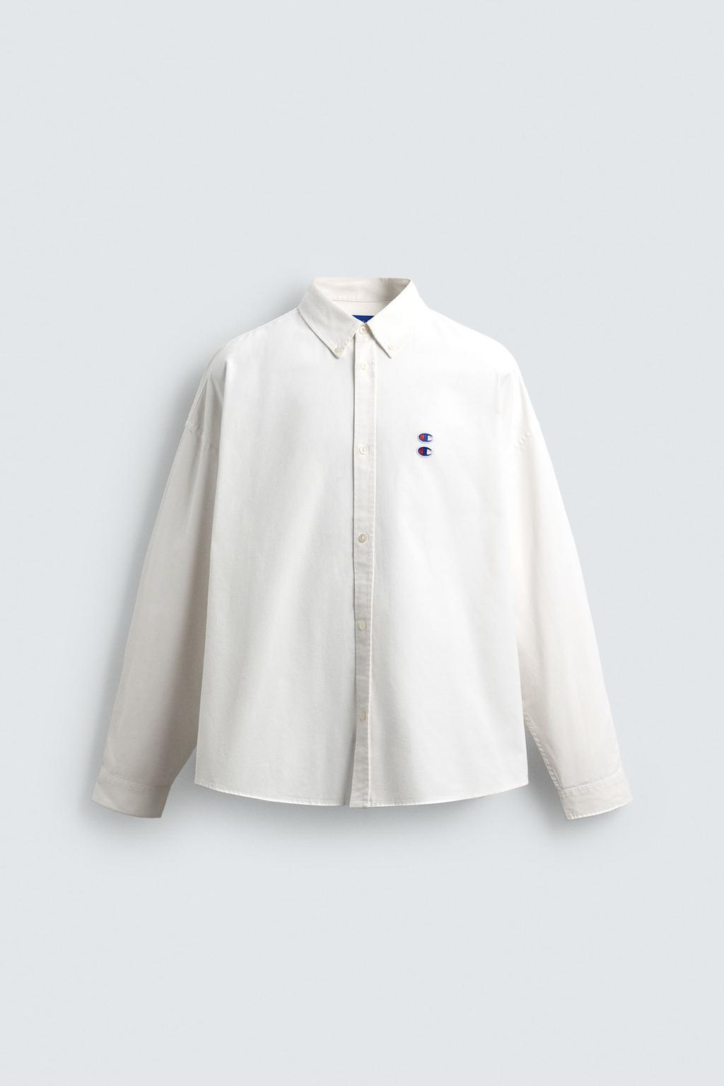 РУБАШКА ОКСФОРД С НАШИВКАМИ CHAMPION ® X ZARA