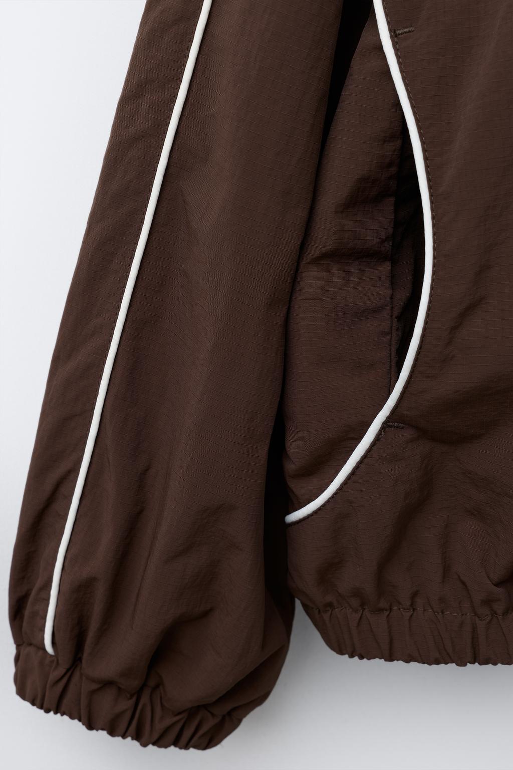 КУРТКА ИЗ НЕЙЛОНА С СУМКОЙ CHAMPION ® X ZARA