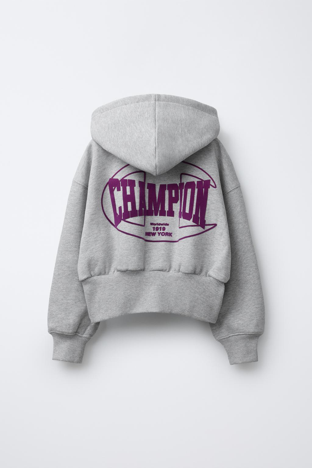 ТОЛСТОВКА НА МОЛНИИ С ТЕКСТОМ И ФЛОКОМ CHAMPION ® X ZARA