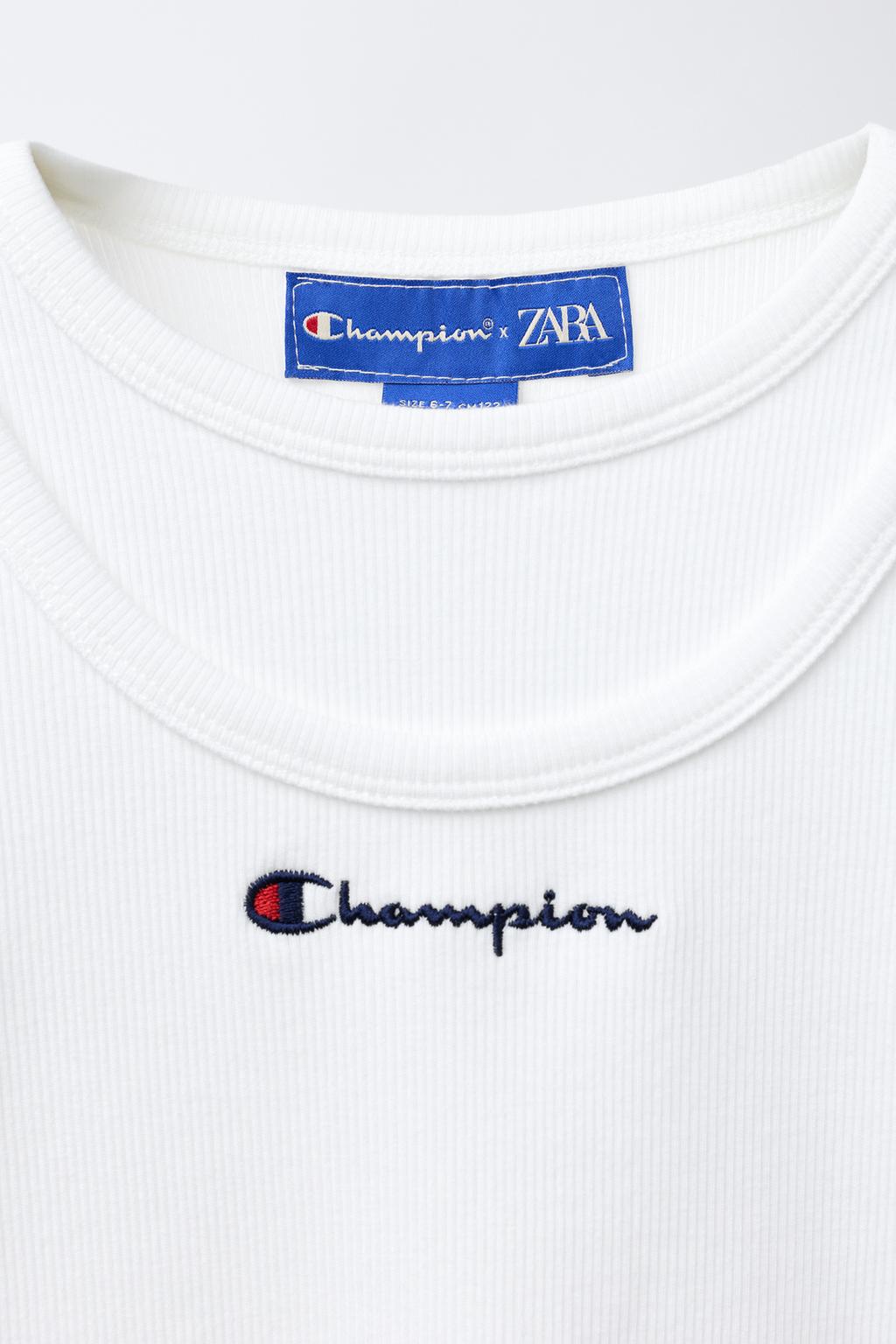 ФУТБОЛКА В РУБЧИК С ТЕКСТОМ CHAMPION ® X ZARA