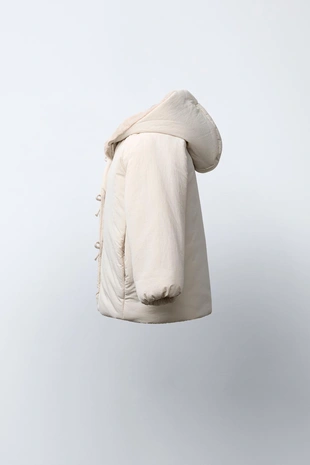 Непромокаемое стеганое пальто с бантами- Заказать в России