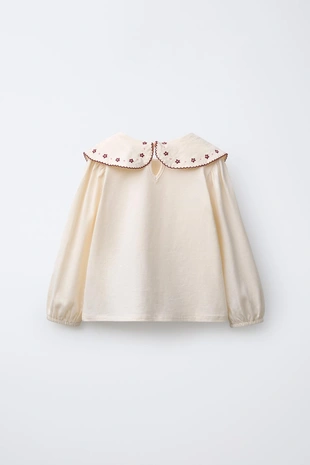 Футболка с круглым воротником и вышивкой- Заказать в России