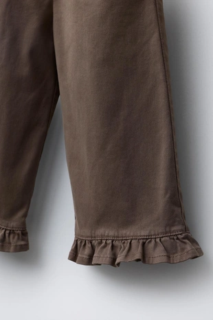 Брюки бэгги с воланами- Заказать в России