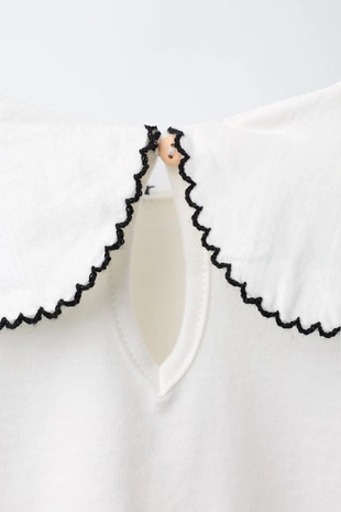 Футболка с круглым воротником и вышивкой- Заказать в России