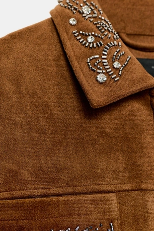 Куртка под замшу с заклепками