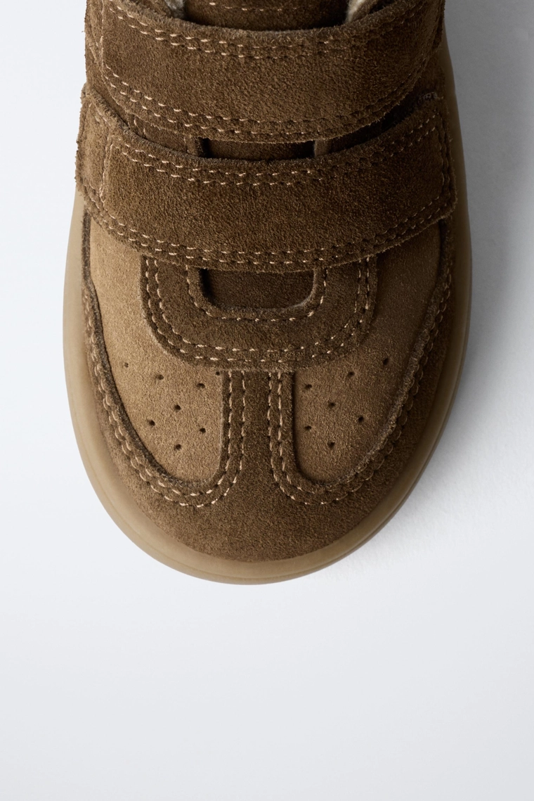 Кожаные кеды на высокой подошве