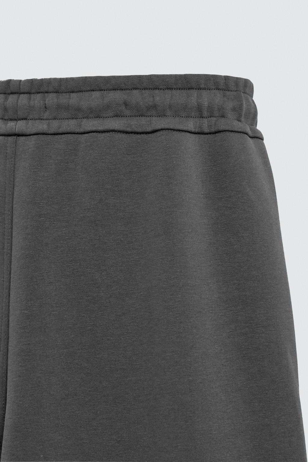 БРЮКИ КАРГО ИЗ НЕОПРЕНА СО СКЛАДКАМИ