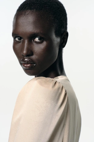 Приталенная блузка из жатой ткани- Заказать в России