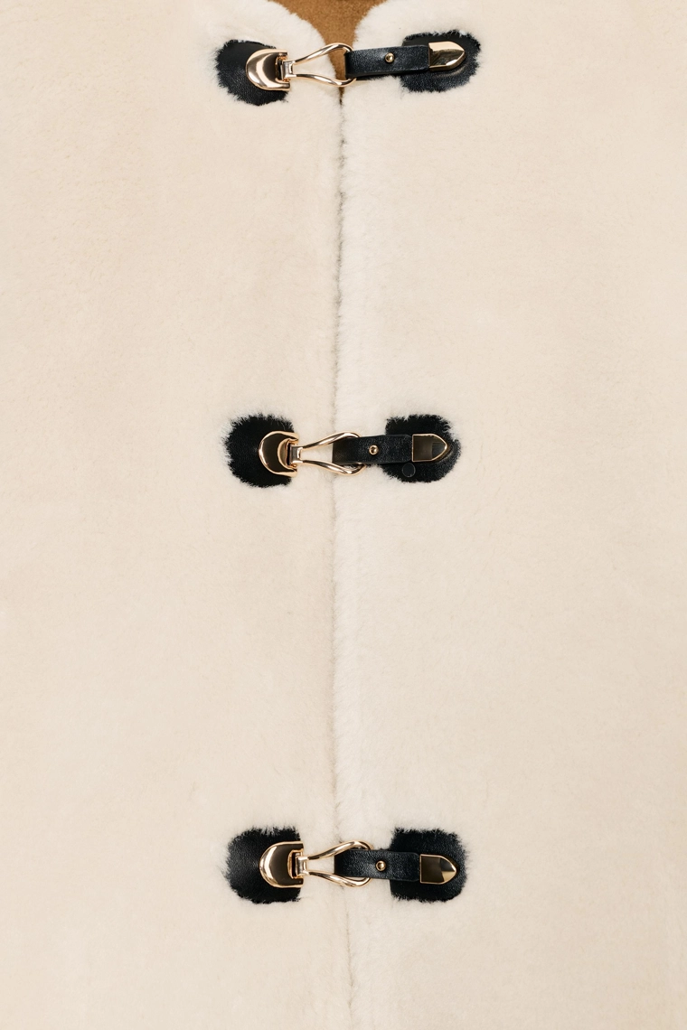 Двусторонняя куртка с застежкой на запонки