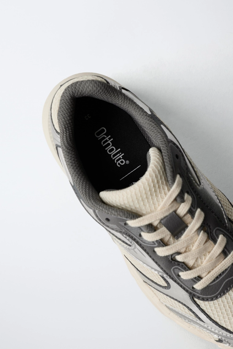 Спортивные кроссовки из сетчатого материала