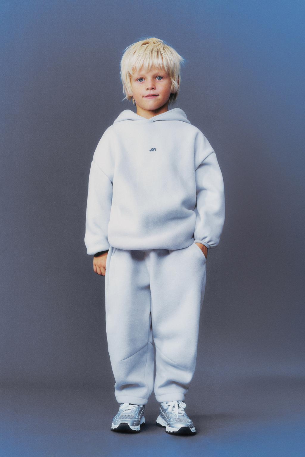 МЕШКОВАТЫЕ БРЮКИ С ФЛИСОВОЙ ПОДКЛАДКОЙ И ЛОГОТИПОМ