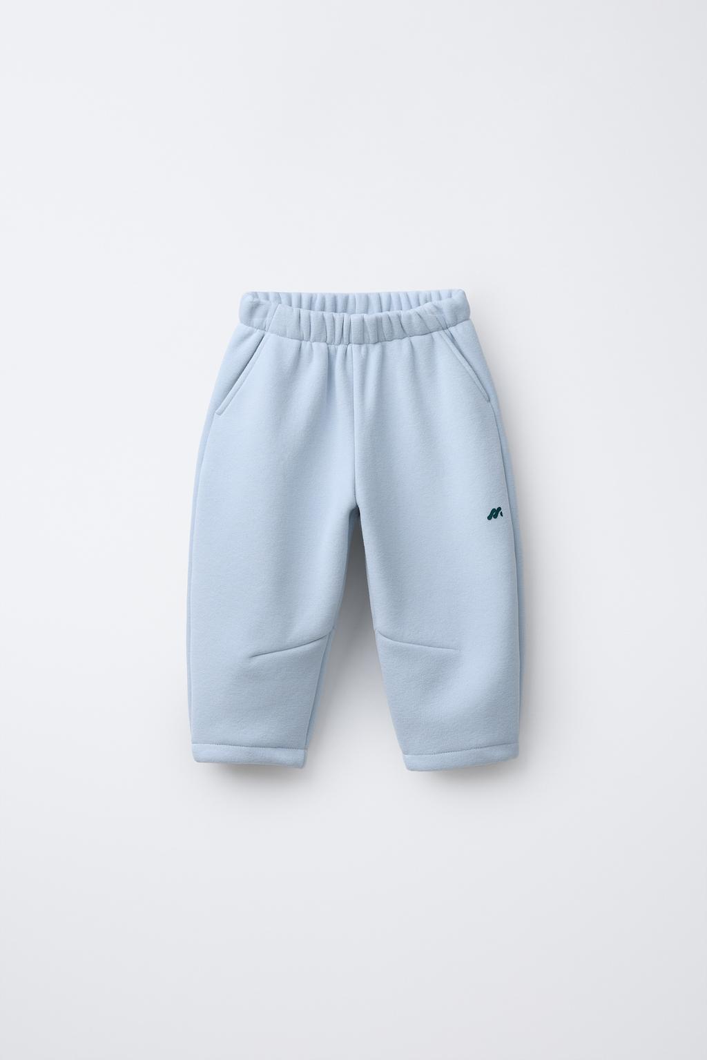 МЕШКОВАТЫЕ БРЮКИ С ФЛИСОВОЙ ПОДКЛАДКОЙ И ЛОГОТИПОМ