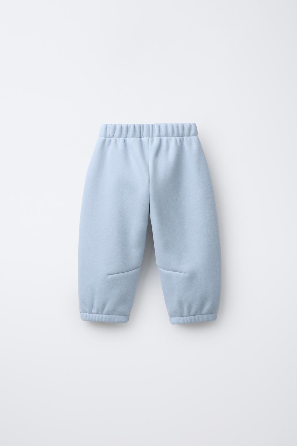 МЕШКОВАТЫЕ БРЮКИ С ФЛИСОВОЙ ПОДКЛАДКОЙ И ЛОГОТИПОМ