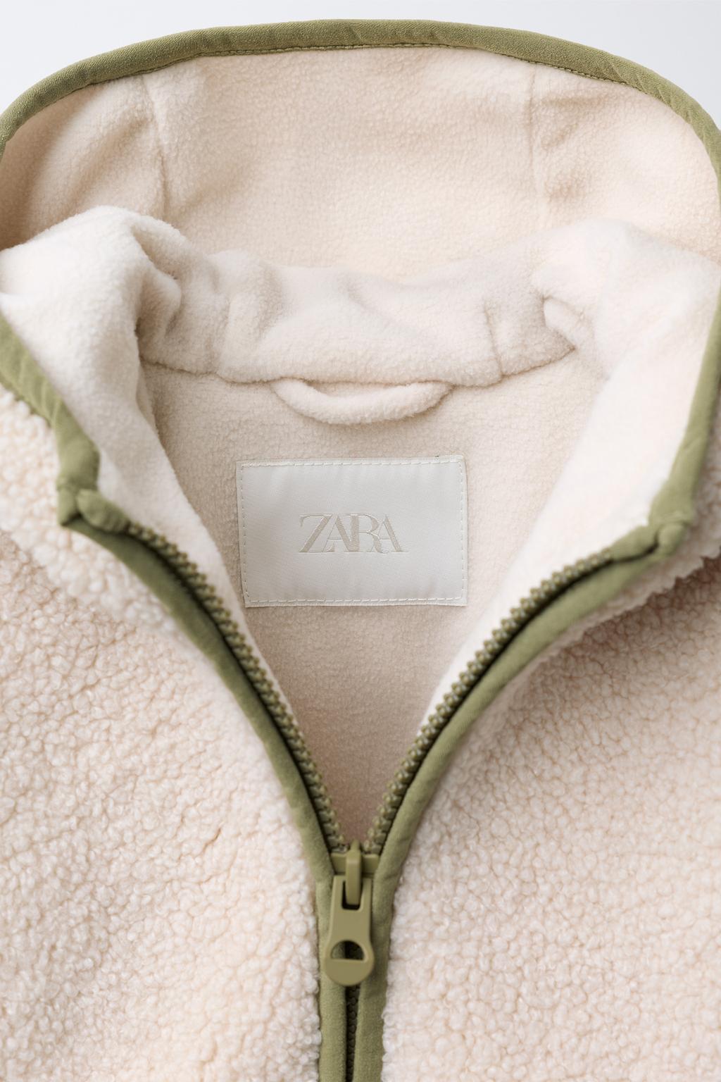 КУРТКА ИЗ ИСКУССТВЕННОЙ ОВЧИНЫ С ФЛИСОМ