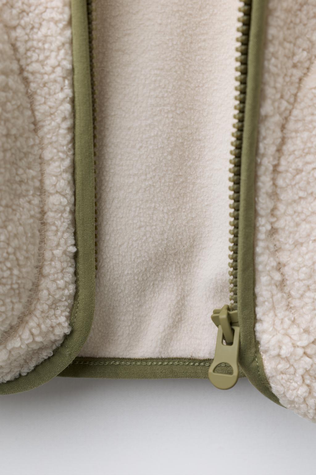 КУРТКА ИЗ ИСКУССТВЕННОЙ ОВЧИНЫ С ФЛИСОМ