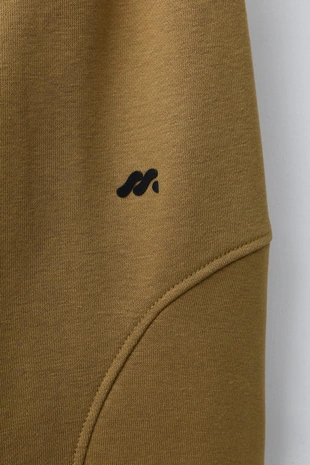 Брюки-джоггеры с рельефным логотипом- Заказать в России