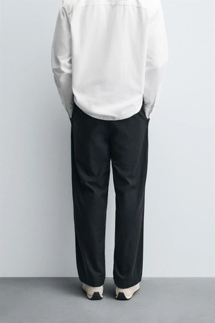 Брюки RELAXED FIT со складками- Заказать в России