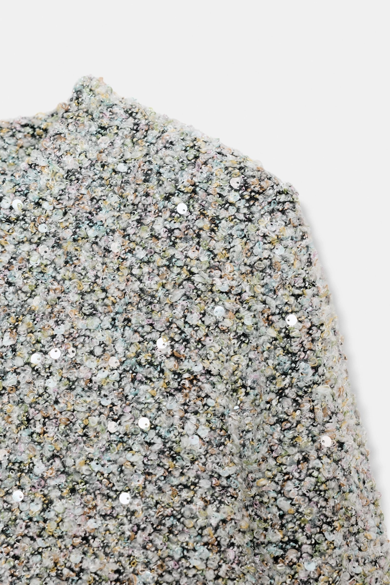 Джемпер с пайетками и длинным рукавом