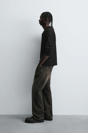 Джинсы RELAXED FLARED FIT- Заказать в России