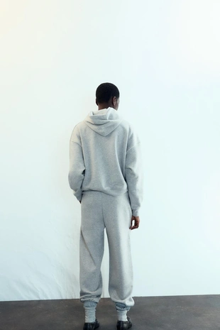 Брюки-джоггеры из блестящей ткани- Заказать в России