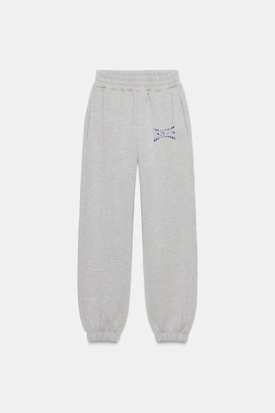 Брюки-джоггеры из блестящей ткани- Заказать в России