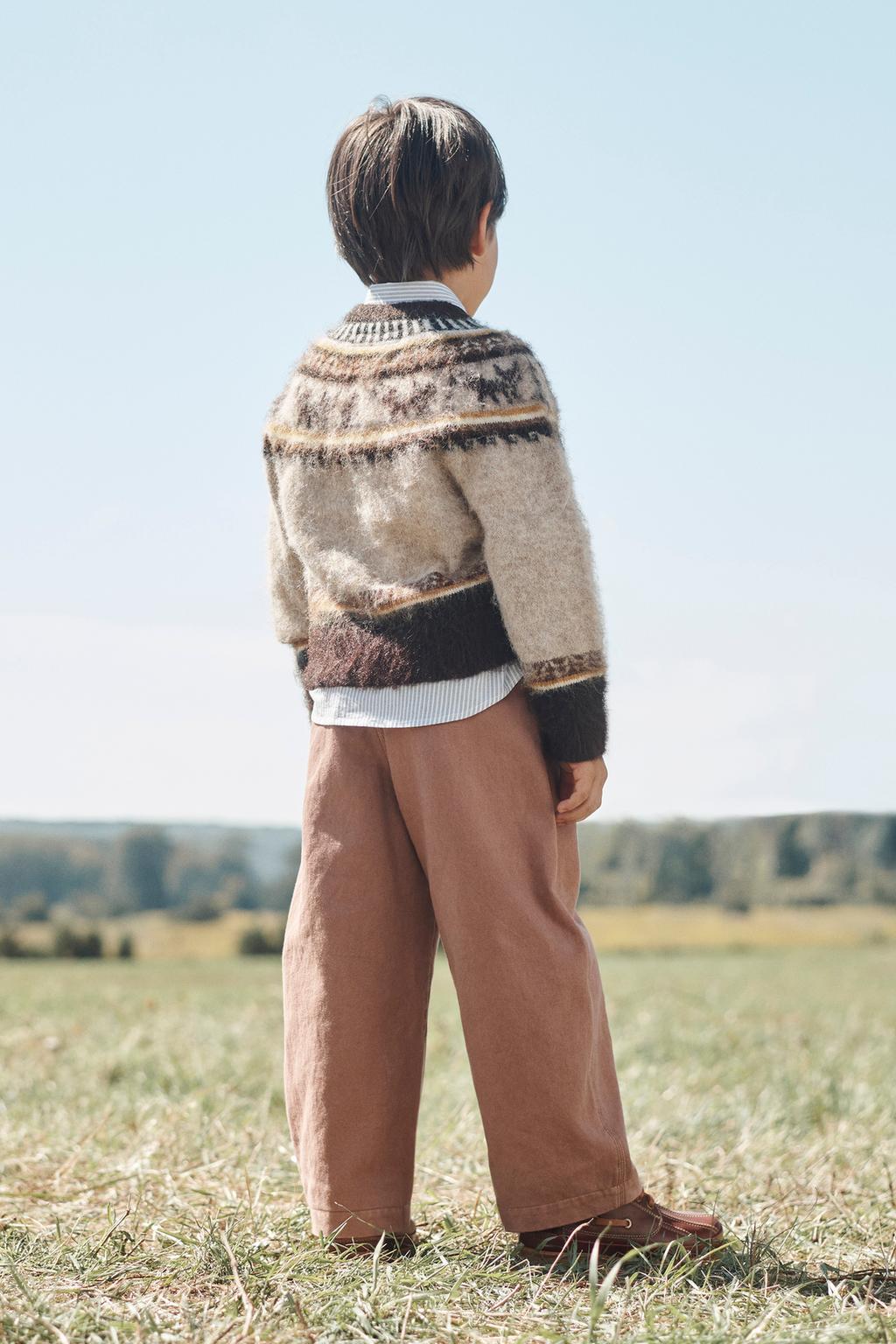 Ограниченное издание вязаного свитера с принтом