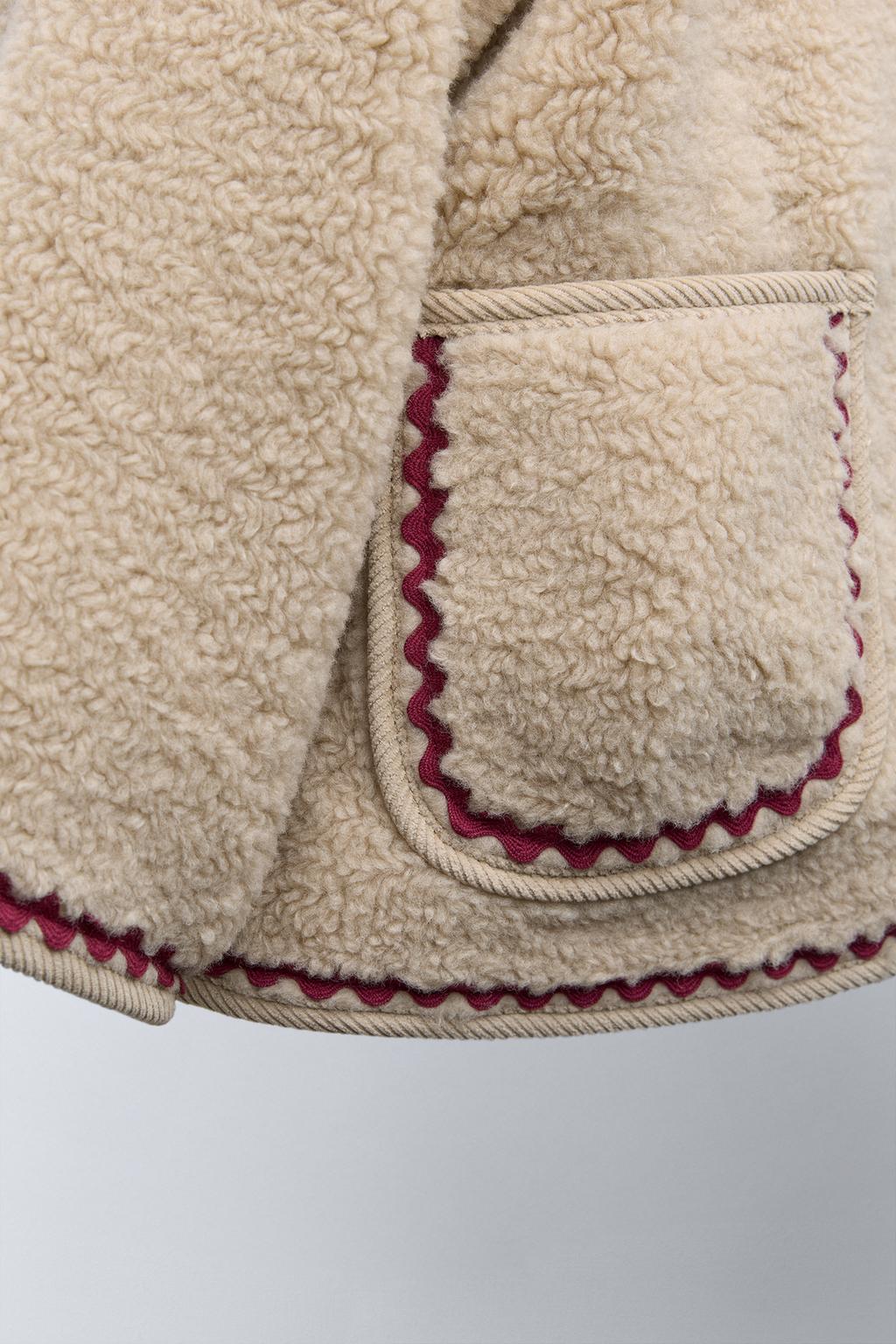 FAUX SHEARLING JACKET WITH WAVY TRIM AND FLEECE LINING
