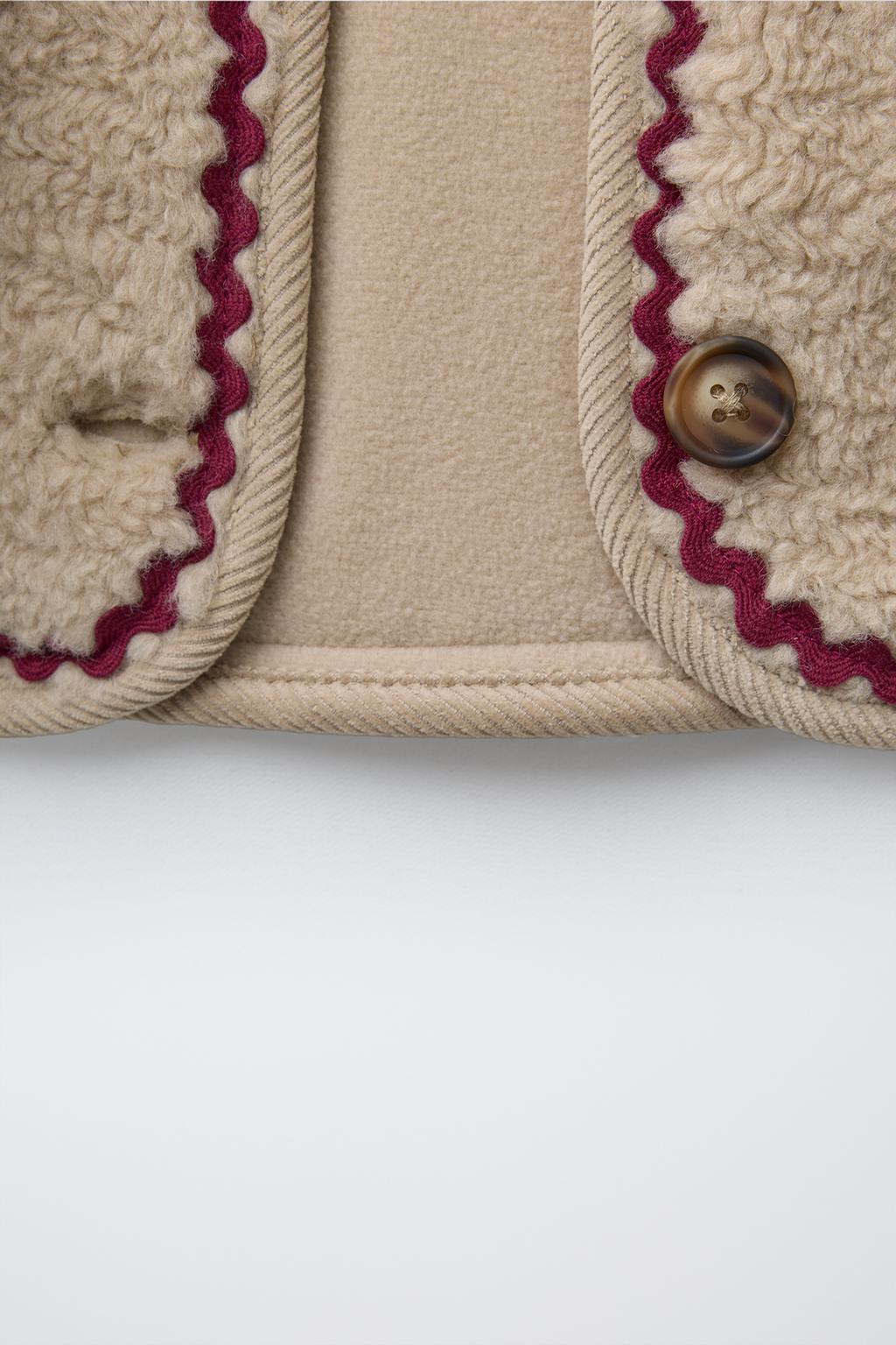 FAUX SHEARLING JACKET WITH WAVY TRIM AND FLEECE LINING